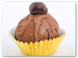 Sweet Sushi Cappuccino Cake Balls- Chocolate cake mixed with a cappuccino icing icing, dipped in milk chocolate and topped with a coffee bean.