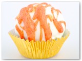 Sweet Sushi Carrot Cake Cake Balls- Carrot cake mixed with our signature cream cheese icing, dipped in premium white chocolate,drizzled with orange chocolate.