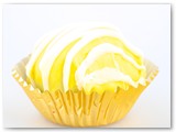 Sweet Sushi Lemon Meringue Cake Balls- Lemon cake mixed with lemon icing, dipped in a yellow chocolate and drizzled with white chocolate.